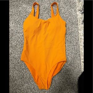 Athleta one piece, orange, size medium, like new.